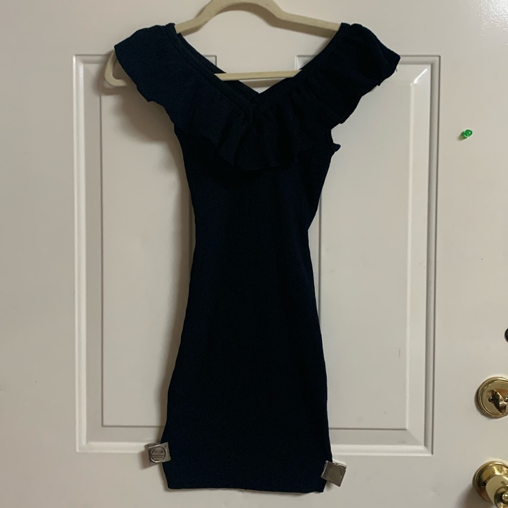 Little black dress size juniors medium, very stretchy ruffled neckline